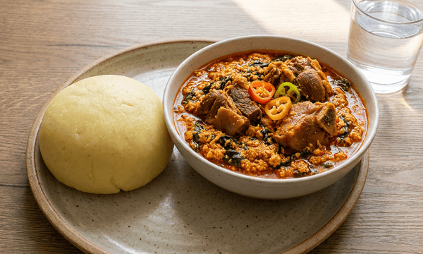 Eba & Egusi Soup (Goat Meat) image
